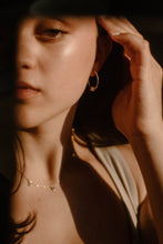 Load image into Gallery viewer, Flower knot hoops, gold hoop earrings, dainty gold hoops, star knot hoops, unique hoops, boho hoops, stacking hoops, medium hoops