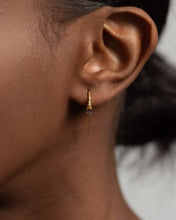 Load image into Gallery viewer, CZ drop wire earring, amethyst huggie hoop, drop hoop earring, unique dainty earring, pear cut cz, dainty gold earring, February birthstone